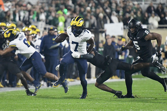 Tyler Morris (8) and Donovan Edwards (7)