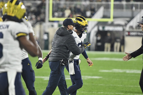 Jim Harbaugh and J.J. McCarthy (9)