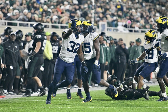 Jaylen Harrell (32), Ernest Hausmann (15), Quinten Johnson (28), and Makari Paige (7)