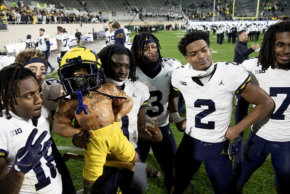 Michigan Team and Paul Bunyan Trophy