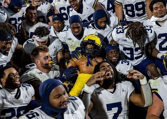 Michigan Team and Paul Bunyan Trophy