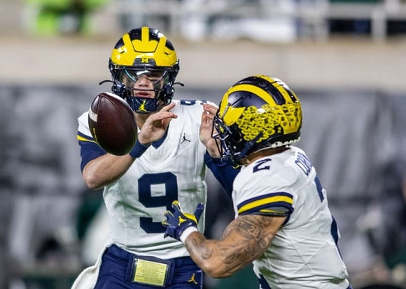 J.J. McCarthy (9) and Blake Corum (2)