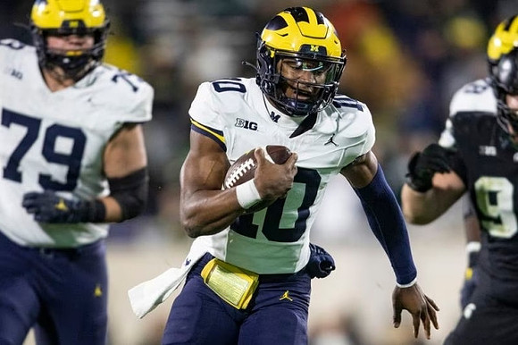 Jeffrey Persi (79) and Alex Orji (10)