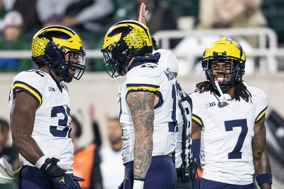 Jaylen Harrell (32), Braiden McGregor (17), and Makari Paige (7)