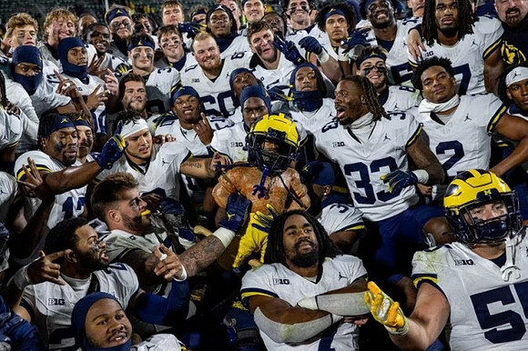 Paul Bunyan Trophy and Michigan Team