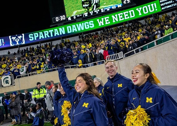 Michigan Cheerleaders and Spartan Stadium
