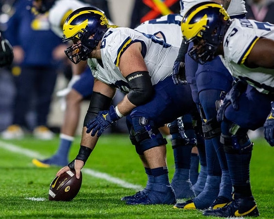Drake Nugent (60) and LaDarius Henderson (73)