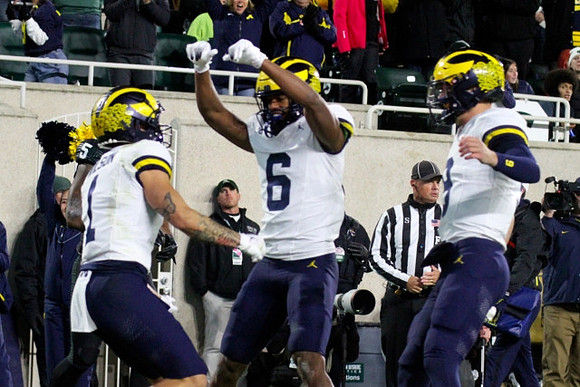 Roman Wilson (1), Cornelius Johnson (6), and J.J. McCarthy (9)