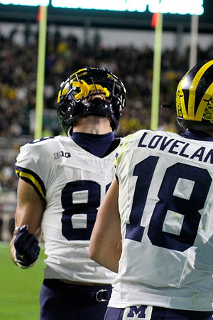 AJ Barner (89) and Colston Loveland (18)