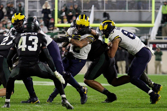 Blake Corum (2) and AJ Barner (89)