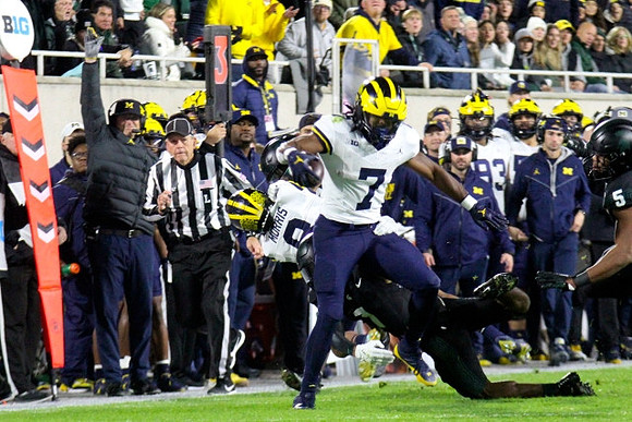 Tyler Morris (8) and Donovan Edwards (7)