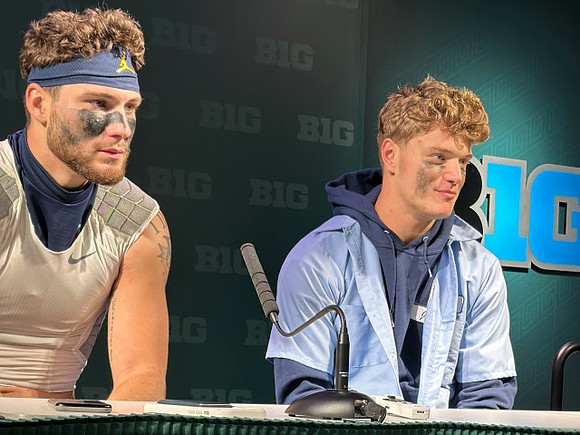 AJ Barner (89) and J.J. McCarthy (9)
