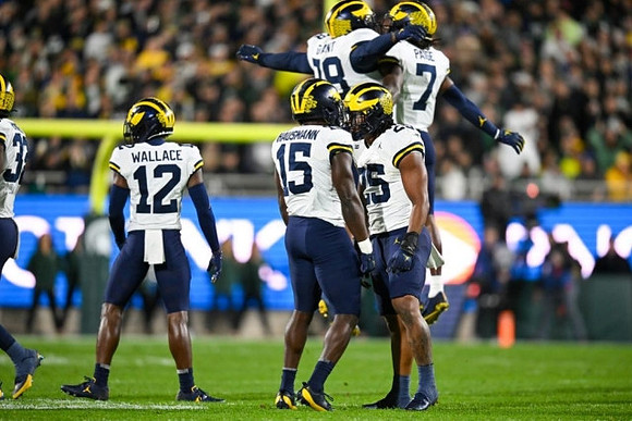 Josh Wallace (12), Ernest Hausmann (15), Junior Colson (25), Kenneth Grant (78), and Makari Paige (7)