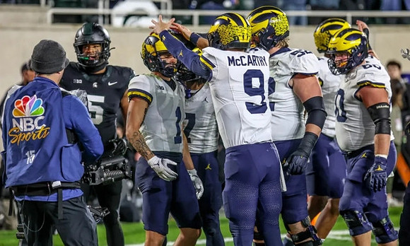 Roman Wilson (1), J.J. McCarthy (9), Karsen Barnhart (52), and Drake Nugent (60)