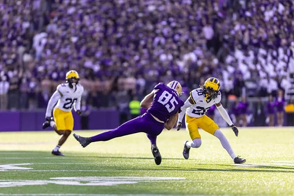 Quinten Johnson (28) and Jyaire Hill (20)