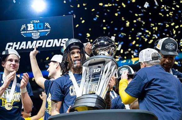 Dusty May, Michigan Team, and Big Ten Tournament Championship Trophy