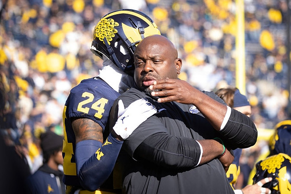 Cole Cabana (24) and Tony Alford
