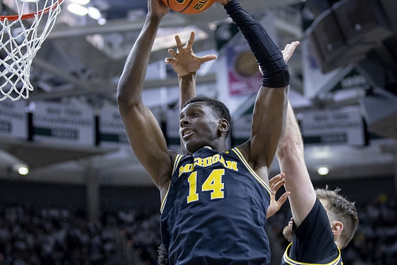 Moussa Diabate (14) and Hunter Dickinson (1)