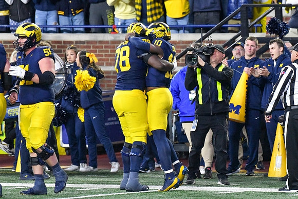Greg Crippen (51), Myles Hinton (78), and Alex Orji (10)