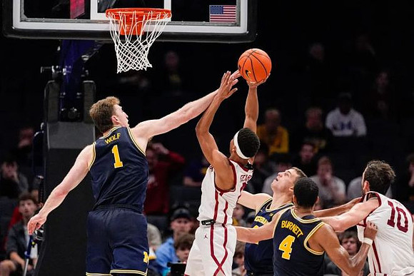 Danny Wolf (1), Will Tschetter (42), and Nimari Burnett (4)