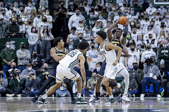 Eli Brooks (55) and Moussa Diabate (14)