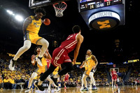 Tarris Reed Jr. (32), Kobe Bufkin (2), and Dug McDaniel (0)