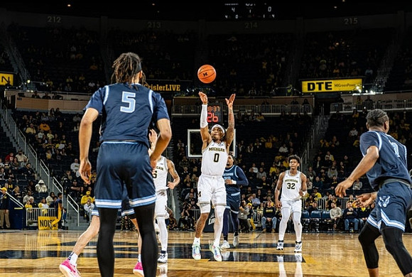 Dug McDaniel (0) and Tarris Reed Jr. (32)