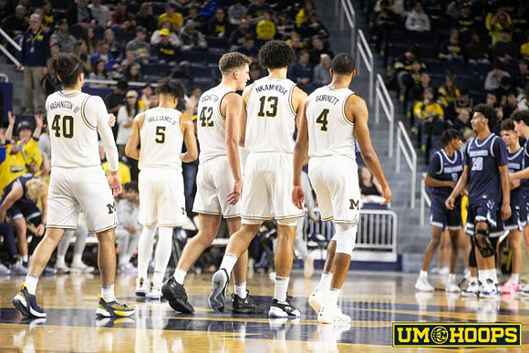 George Washington III (40), Terrance Williams II (5), Will Tschetter (42), Olivier Nkamhoua (13), and Nimari Burnett (4)