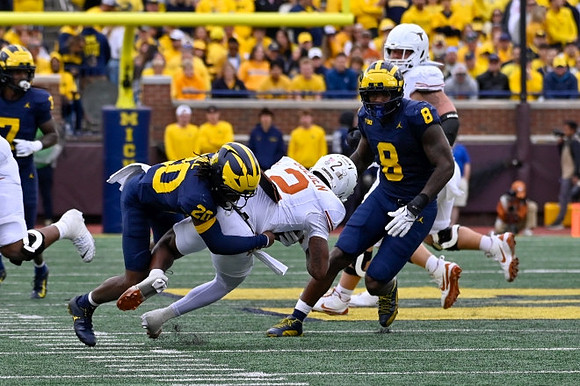 Jyaire Hill (20), Derrick Moore (8), and Makari Paige (7)