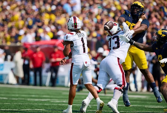 Kenneth Grant (78) and Derrick Moore (8)