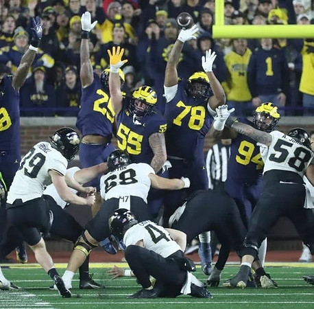 Junior Colson (25), Mason Graham (55), Kenneth Grant (78), and Kris Jenkins (94)