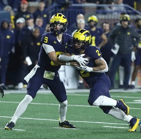 J.J. McCarthy (9) and Blake Corum (2)
