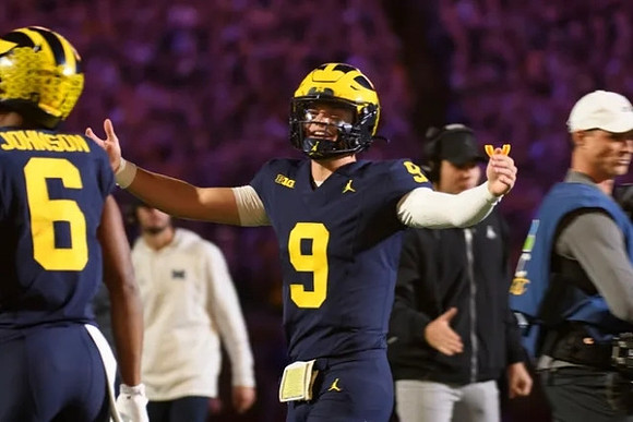 Cornelius Johnson (6) and J.J. McCarthy (9)