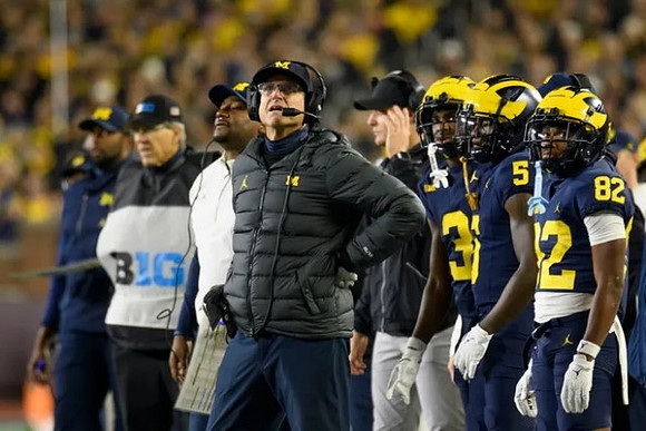 Jim Harbaugh and Michigan Team