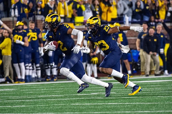 Will Johnson (2) and Michael Barrett (23)