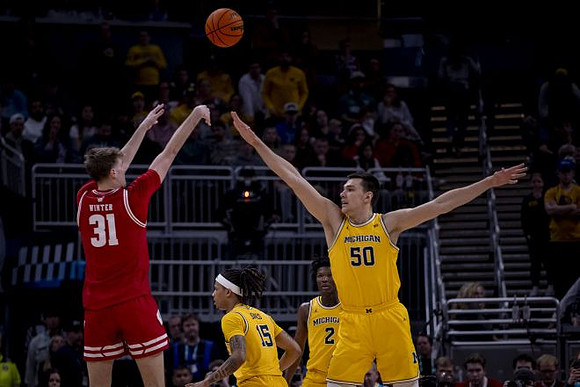 Rubin Jones (15), L.J. Cason (2), and Vladislav Goldin (50)