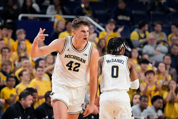 Will Tschetter (42) and Dug McDaniel (0)