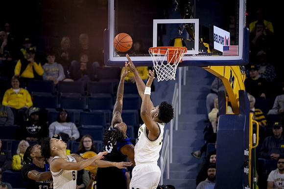 Terrance Williams II (5) and Tarris Reed Jr. (32)