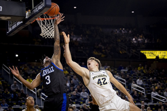 Nimari Burnett (4) and Will Tschetter (42)