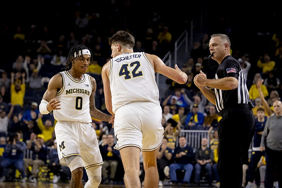 Dug McDaniel (0) and Will Tschetter (42)