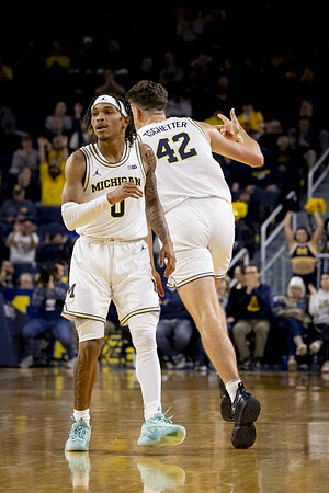 Dug McDaniel (0) and Will Tschetter (42)