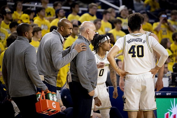 Saddi Washington, Phil Martelli, Dug McDaniel (0), and George Washington III (40)