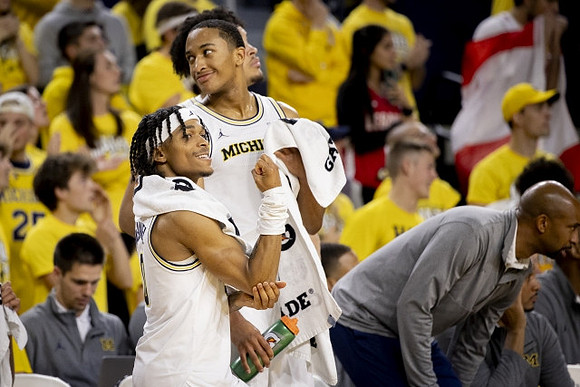 Saddi Washington and Michigan Team