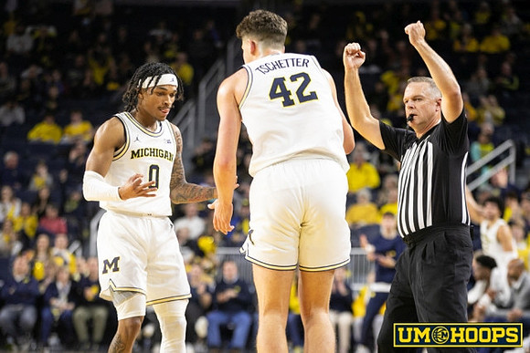 Dug McDaniel (0) and Will Tschetter (42)