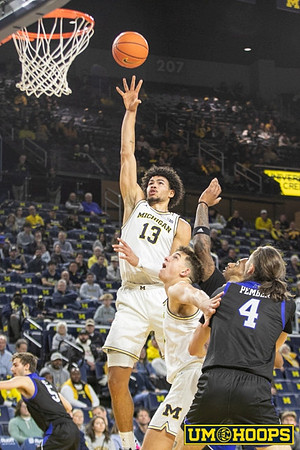 Olivier Nkamhoua (13) and Will Tschetter (42)