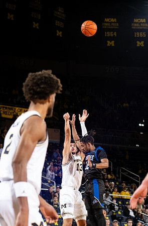 Tray Jackson (2) and Olivier Nkamhoua (13)