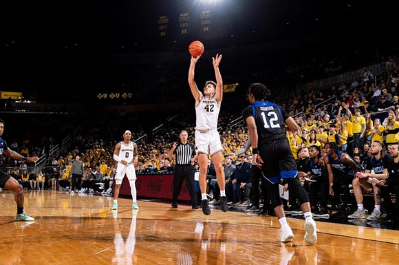 Dug McDaniel (0) and Will Tschetter (42)