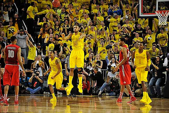 Trey Burke (3), Jon Horford (15), and Glenn Robinson III (1)