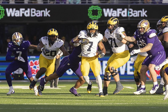 Kalel Mullings (20), Donovan Edwards (7), and Evan Link (71)