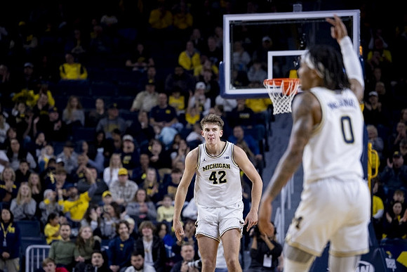 Will Tschetter (42) and Dug McDaniel (0)